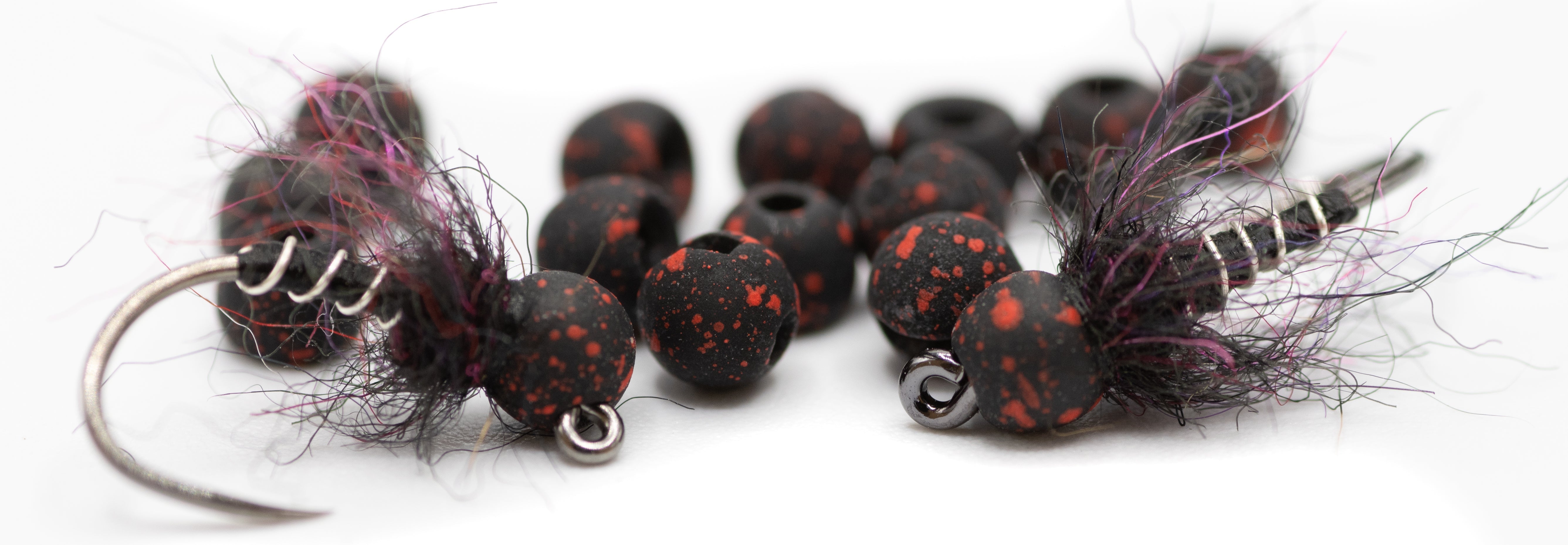 Euro nymph tied on a Firehole jig hook with a slotted tungsten bead