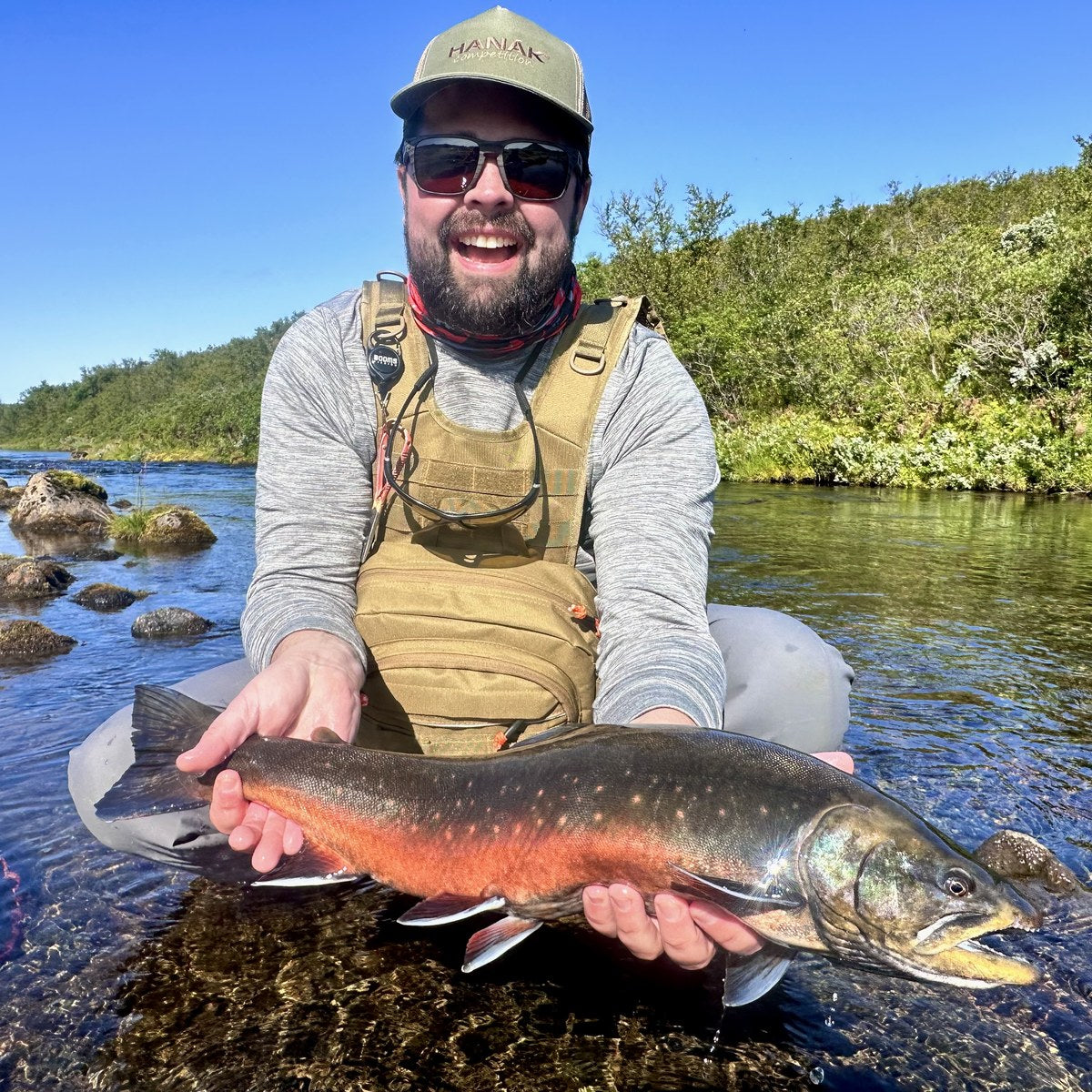 Heimir Gudmundsson with a 25 inch sea-run Arctic char from the Brunná, caught on a Blade on a Firehole 520