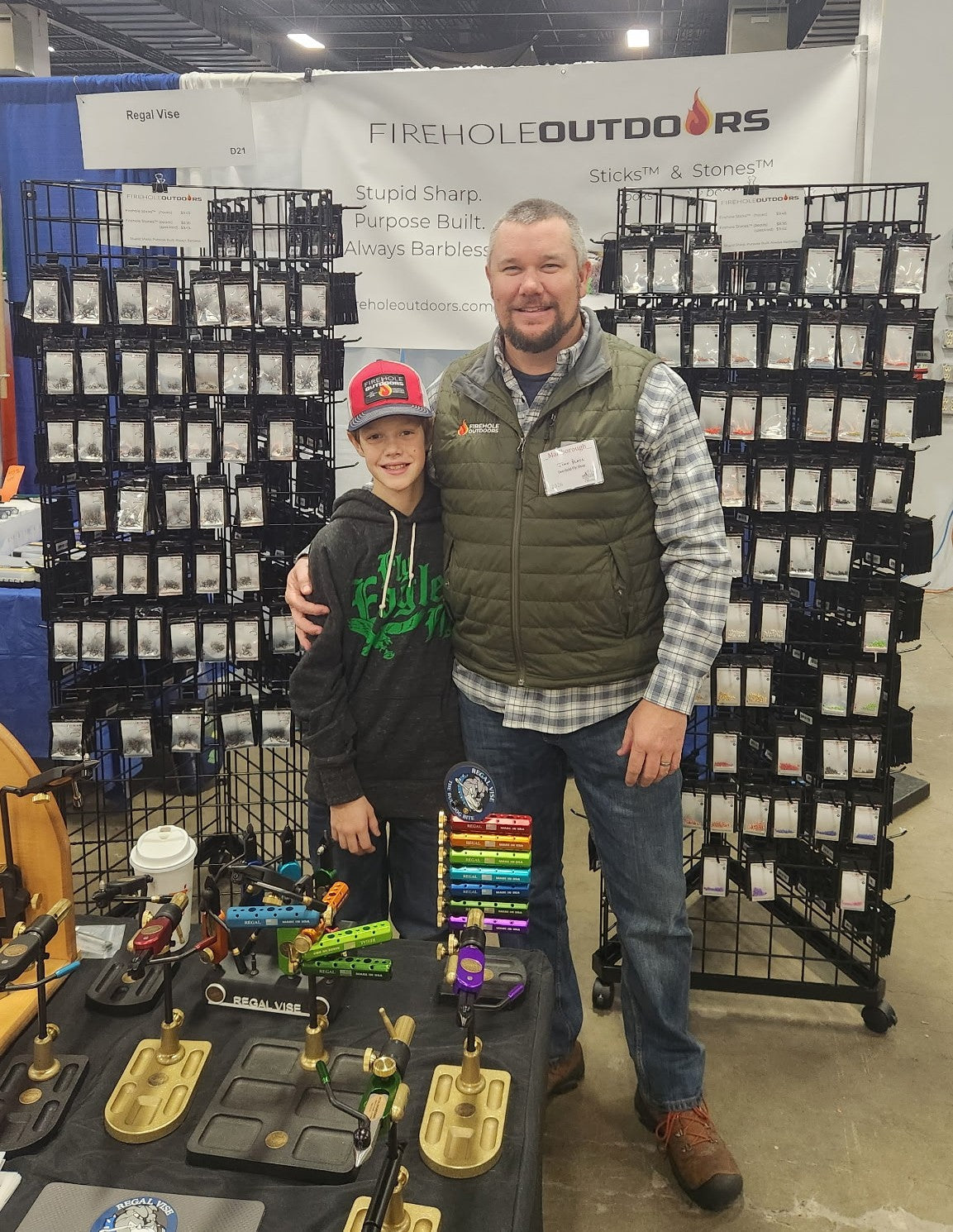 John Place and his son at the Firehole Outdoors booth at the Fly Fishing Show in Marlboro, Massachusetts